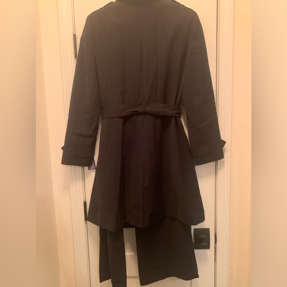 Black and white pinstriped pants suit